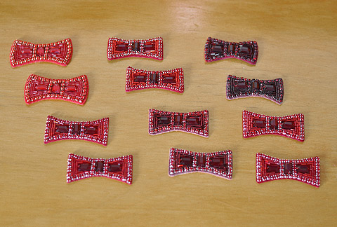 Hand-sewn bows for Judy Garland's ruby slippers